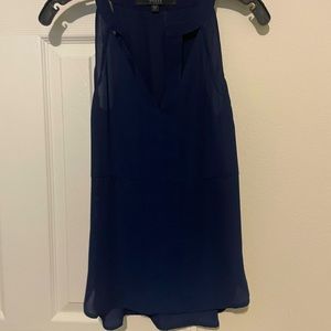 Blue size XS guess top with key holes on caller loose fitting great condition